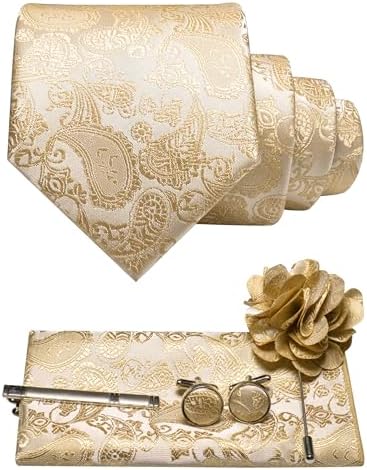 Sæt i cremehvid og guld med paisleymønster: slips, lommeklud, manchetknapper, slipsenål og reversbroche i blomsterform. 2
