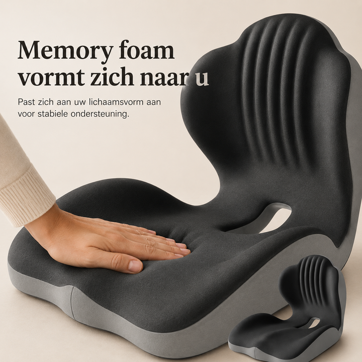 En hånd trykker ned i den formede memory foam-sæde på det mørkegrå hynde 3