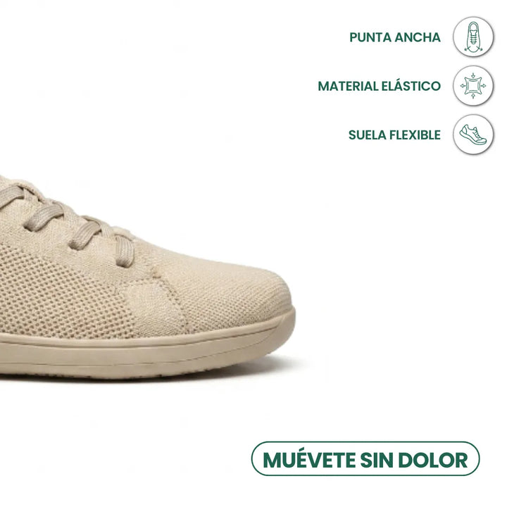 Tæt på den beige sneakers brede tå med ikoner for bred tåboks, elastisk materiale og fleksibel sål. 5