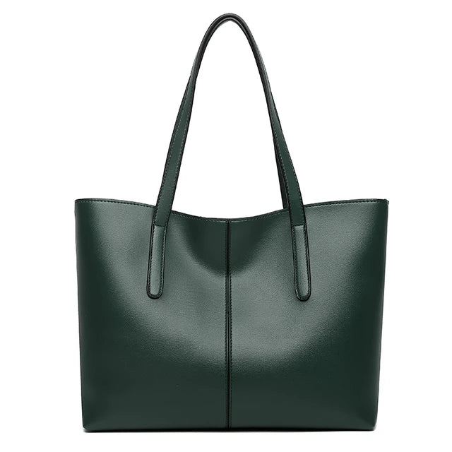 Mørkegrøn totebag set forfra mod hvid baggrund med lange stropper og midtersøm 7