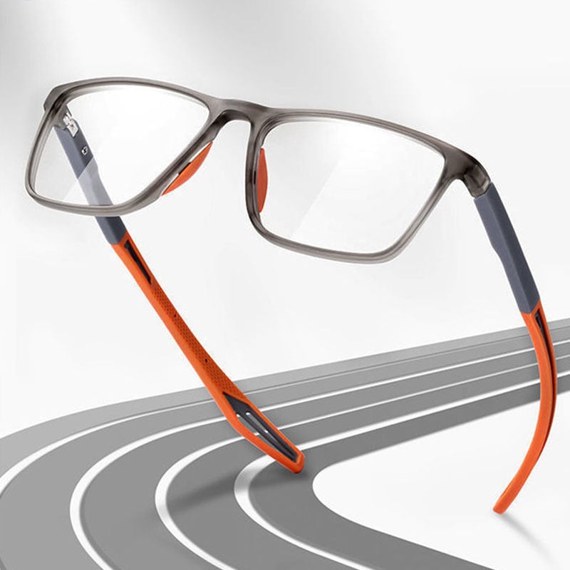 Grå brille med orange bøjler svævende over en grafisk løbebane på lys baggrund 4