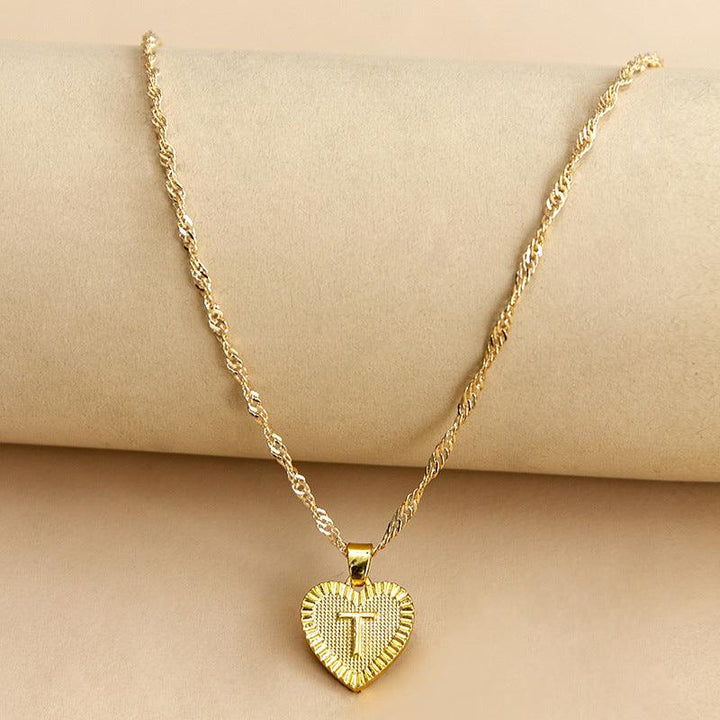 Goldene Herz-Halskette mit Kreuzanhänger, elegantes Schmuckstück, Damenmode, Geschenkidee.