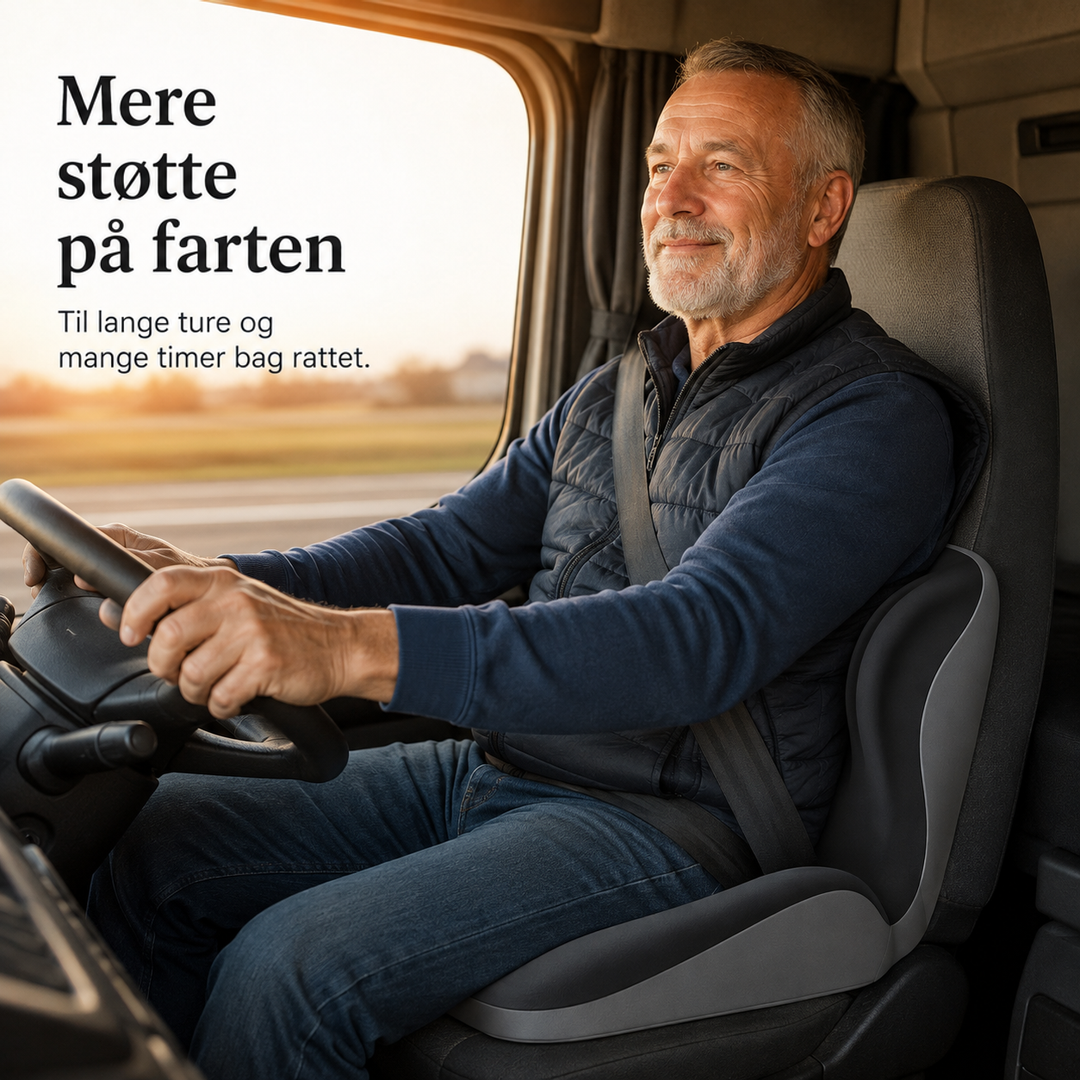 Mand i vest kører lastbil med sædehyndet placeret på førersædet bag ryggen 5