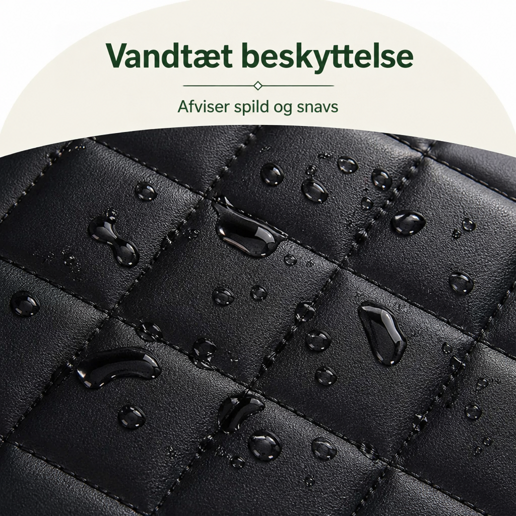 Nærbillede af sort kunstlæderagtig vatteret overflade med vanddråber, der perler af og viser den vandtætte overflade. 3