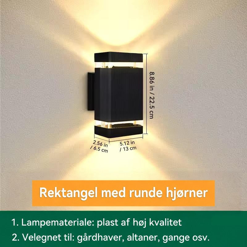 Kompakt rektangulær væglampe med ét lysbånd i hver ende, vist med mål for højde, bredde og dybde 16