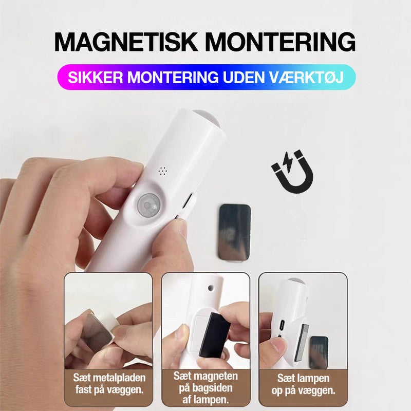 Hænder monterer lampen magnetisk på væggen i tre trin med metalplade, magnet og lampe 11