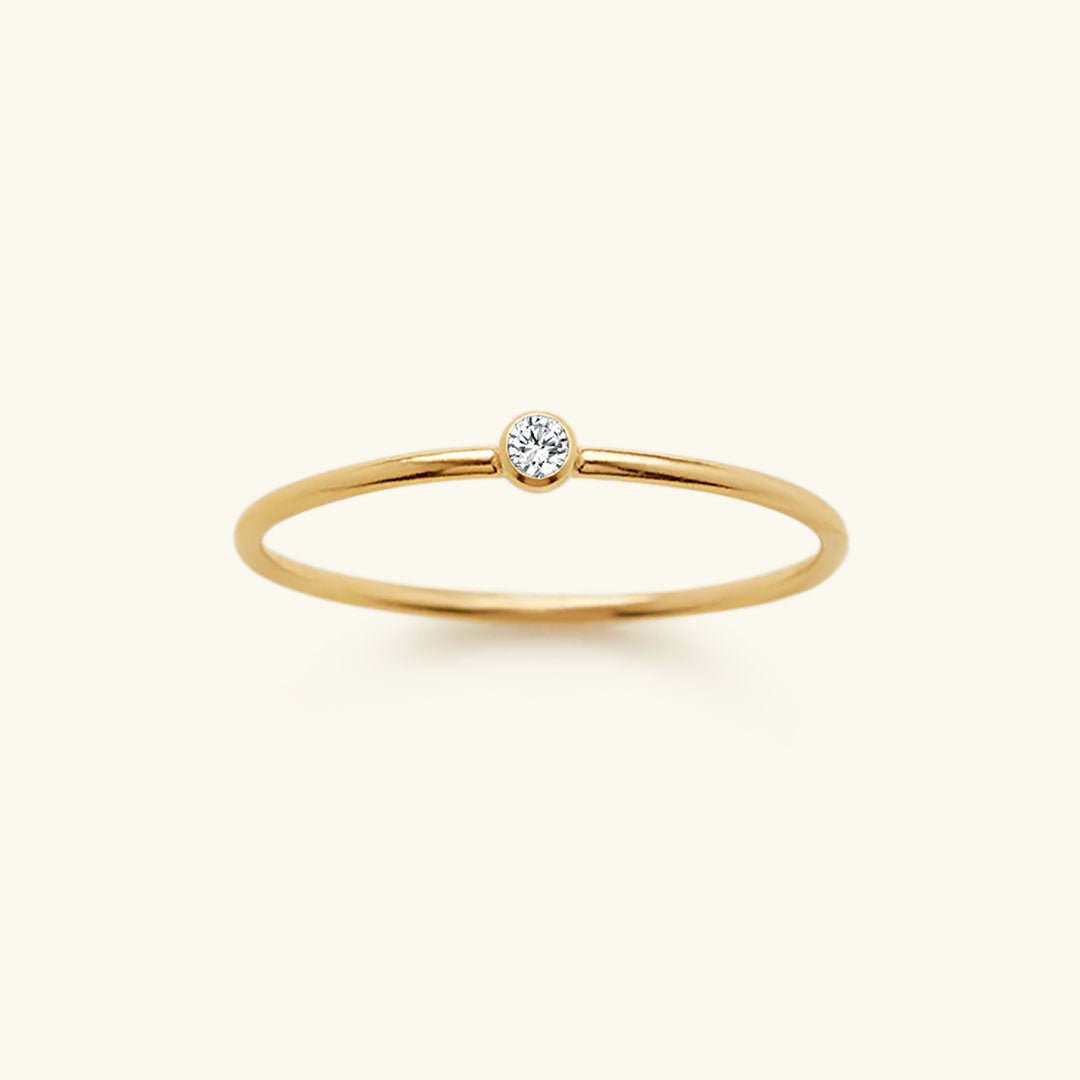 Goldener Ring mit Diamant, minimalistisches Design, eleganter Schmuck, Verlobungsring, Damen.
