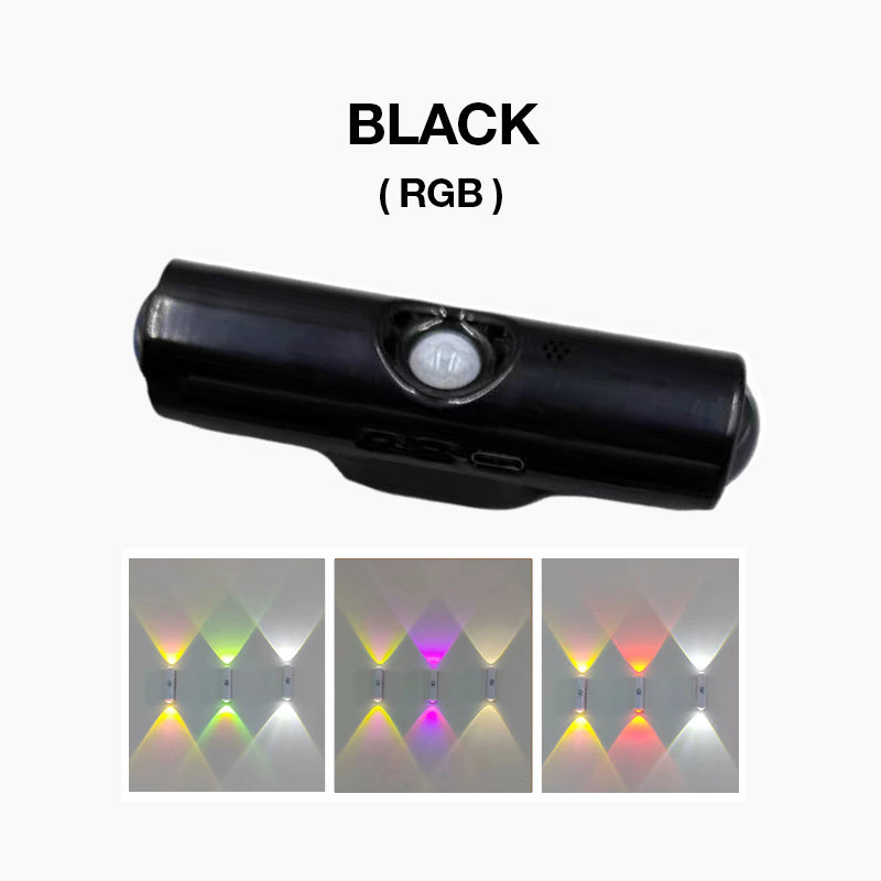 Sort cylinderformet væglampe med bevægelsessensor, vist over tre eksempler på farveskiftende RGB-lys 4